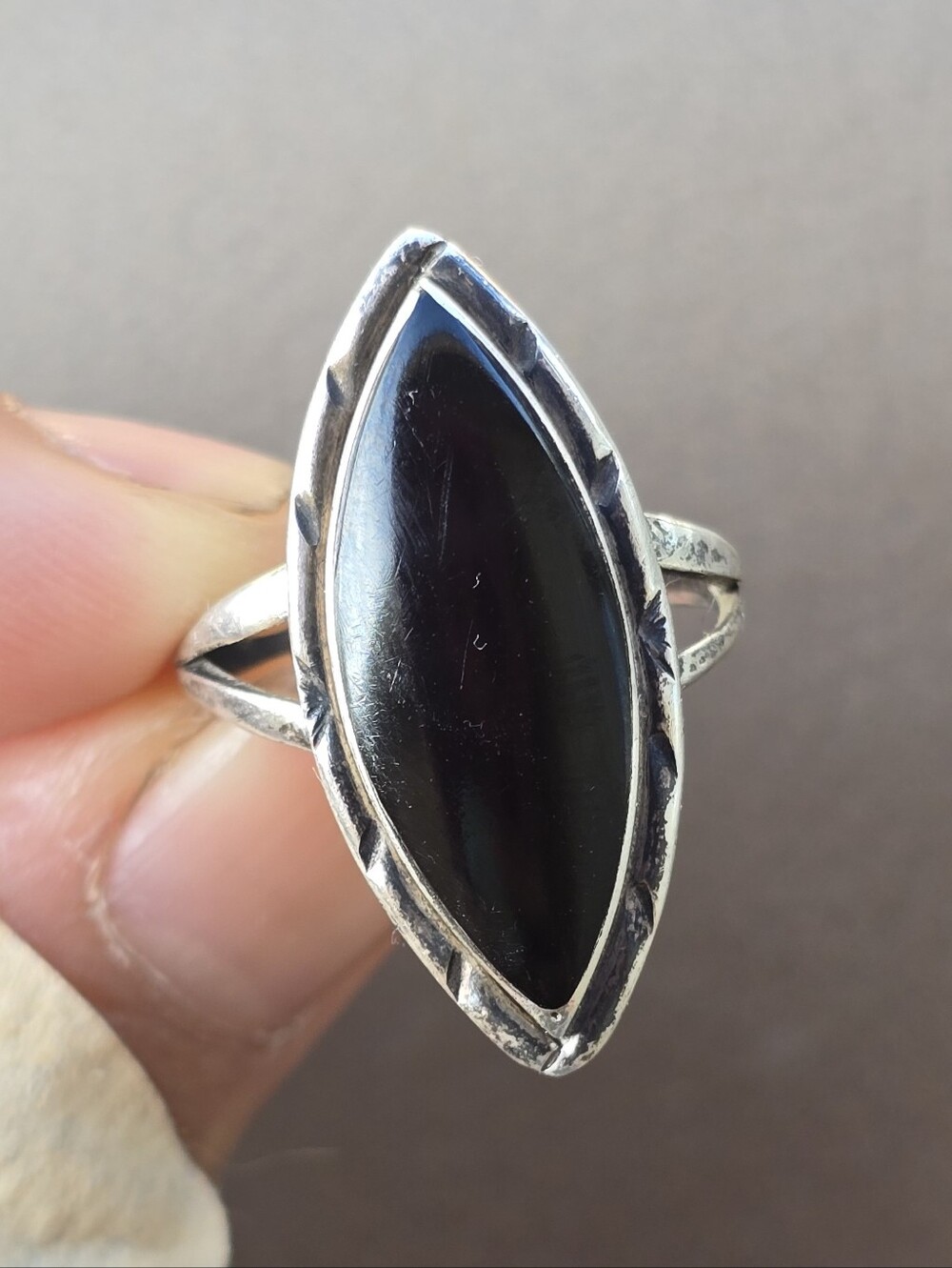Striking Native American marquise cut onyx with etched halo sterling silver ring